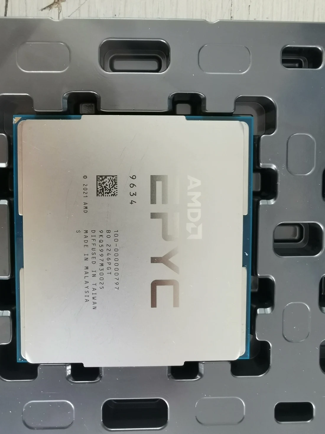 AMD EPYC 9634 — label reference photo 1